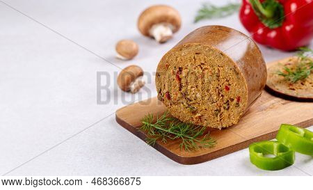 Mushroom Based Vegan Sausage With Vegetables And Spices On Wooden Board, Top View, Closeup. Meat Alt