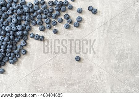 Fresh Blueberries On Gray Background. Blueberries Background. Healthy Berry, Organic Food, Antioxida