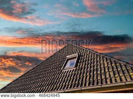 Open Roof Window In Velux Style With Black Roof Tiles