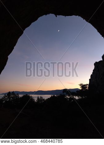 Millenium Cave In A Limestone Cliff In Cala Gonone Sardinia