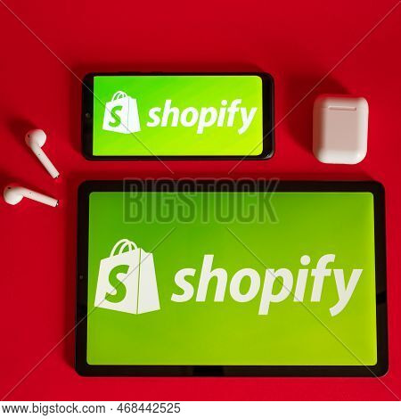 Tokio, Japan - June 05, 2022: Shopify Web Page Displayed On A Modern Laptop, Smartphone And Notebook