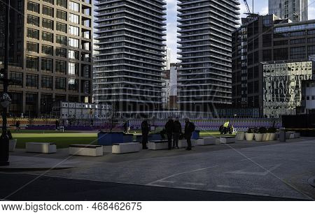 London - 01 26 2022: Play Area In Bank Street With People And Skyscrapers In The Background