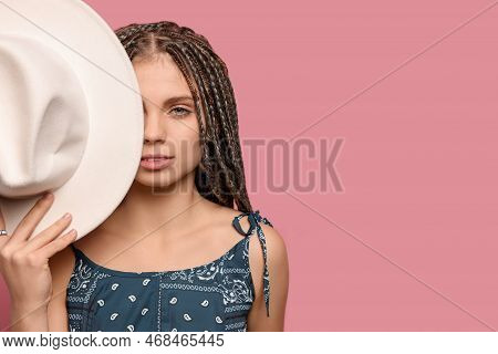 Beautiful Woman With Long African Braids And Hat On Pink Background, Space For Text