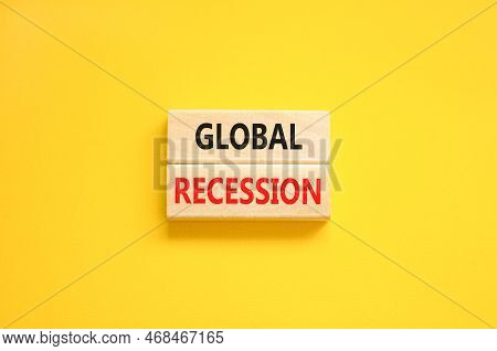 Global Recession Symbol. Concept Words Global Recession On Wooden Blocks. Beautiful Yellow Table Yel