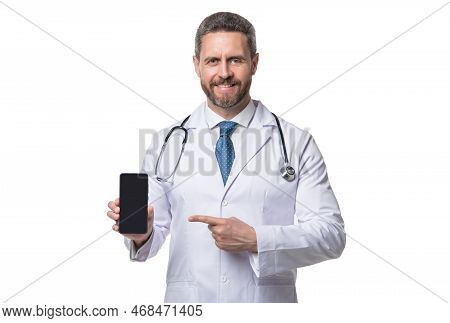 Medical Application. Cheerful Doctor Presenting Medical Phone Application. Emedicine In Your Phone.