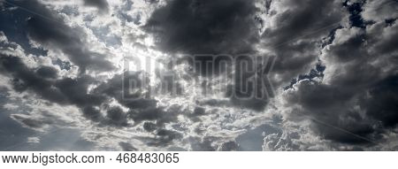 Banner Dramatic Dark Storm Clouds Black Sky Background. Dark Thunderstorm Clouds Rainny Season. Pano