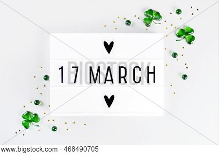 Lightbox With Saint Patricks Day Greeting And Shamrocks Of Green Glass Hearts