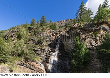 Centuries-old Granite Karst Rocks Have Formed Crevice In Rock Along Which Silvery Streams Of Lillaz 