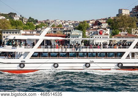 Istanbul, Turkey - May 21, 2022: Turks Standing On A Ship, A Ferryboat In Istanbul, A Vapur, A Ferry