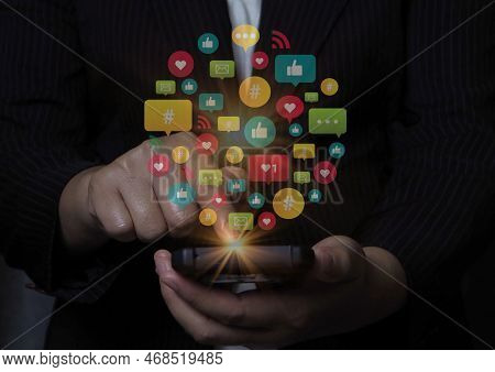 Social Media And Digital Online Concept, Man Using Smart Phone With Social Media. The Concept Of Liv