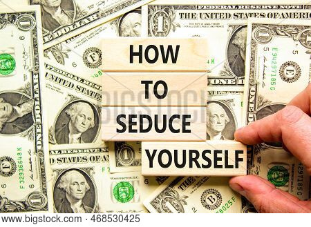 How To Seduce Yourself Symbol. Concept Word How To Seduce Yourself On Wooden Blocks. Businessman Han