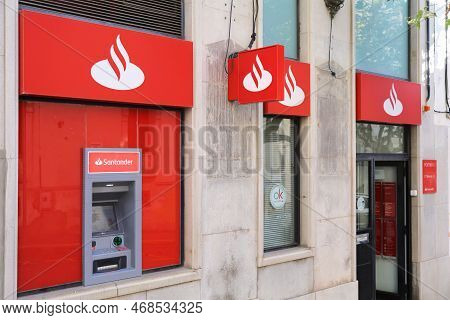 Portbou, Spain - October 5, 2021: Santander Bank Atm Cash Machine In Spain. Santander Group Is One O