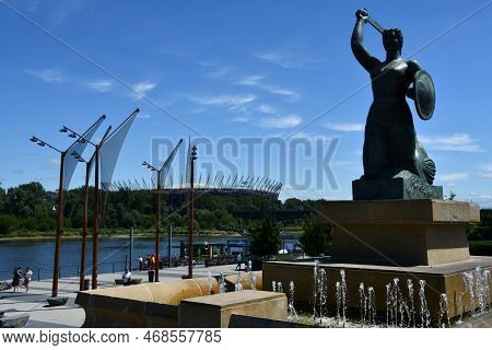Warsaw, Poland - Jul 3:  Syrenka Mermaid Statue By Vistula River In Warsaw, Poland, As Seen On July 