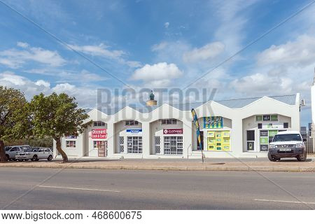Bredasdorp, South Africa - Sep 23, 2022: A Street Scene, With Businesses And Vehicles, In Bredasdorp
