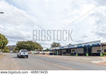 Bredasdorp, South Africa - Sep 23, 2022: A Street Scene, With A Battery, Brake And Tyre Workshop, In