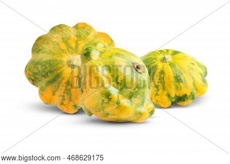 Three Fresh Yellow Pattypan Squashes On White Background