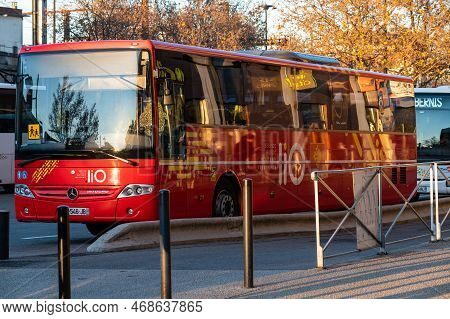Nimes, Occitanie, France, 12 31 2022 - Red Public Transportation Bus Of The Lio Occitanie Company