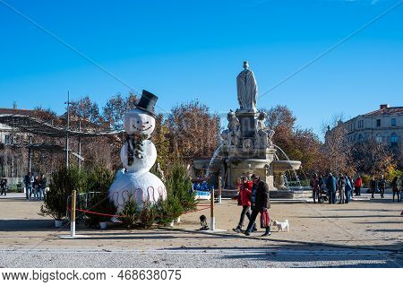Nimes, Occitanie, France, 12 31 2022 - The Pradier Fountain And Statue At The Esplanade Square In Ol