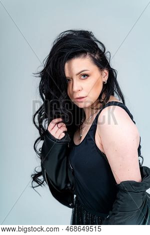 Portrait Of Beautiful Lady In Jacket Looking At The Camera While Posing. Fashionable Lifestyle Woman