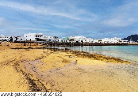 Beach And White Architecture In Caleta Del Sebo, La Graciosa, Canary Islands, Spain
