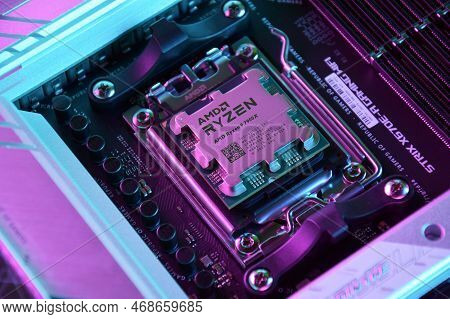 Close-up Of An Amd Ryzen 9 3900X Processor Installed On A Motherboard Asus Rog Strix X670E