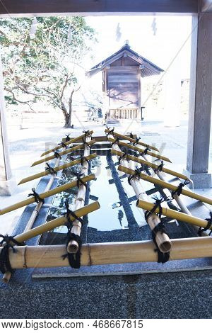 The Purification Fountain 'chozuya' In The Japanese Shrine. It's Place Where You Wash Your Hands And