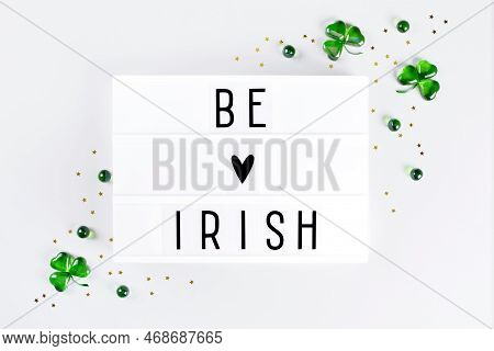 Lightbox With Saint Patricks Day Greeting And Shamrocks Of Green Glass Hearts
