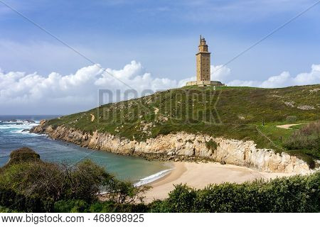Hercules Tower Roman Lighthouse Since Lapas Beach In The City Of A Coruña In A Sunny Day, Galicia, S