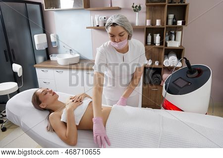 Before Endosphere Therapy Of Female Body By Cosmetologist In Beauty Salon