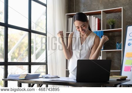 Entrepreneur Of Beautiful Business Asian Young Woman Working On Aptop And Celebrating Her Work Succe