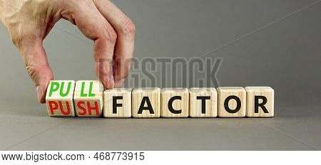 Pull Or Push Factor Symbol. Concept Word Pull Factor And Push Factor On Wooden Cubes. Beautiful Grey