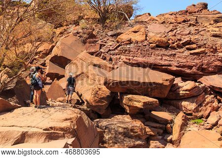 Twyfelfontein, Damaraland, Namibia - 05 October 2018: Tourists In Twyfelfontein, Site Of Ancient Roc