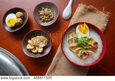 Congee Porridge With Chicken Slice, Tofu, Egg. Congee Porridge From Hong Kong. Chinese Food