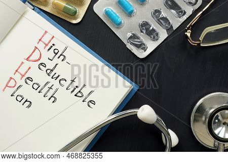 High-deductible Health Plan Hdhp Is Shown On A Conceptual Business Photo