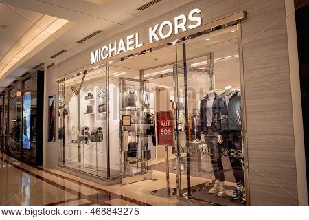 Kuala Lumpur, Malaysia - December 04, 2022: Michael Kors Brand Retail Shop Logo Signboard