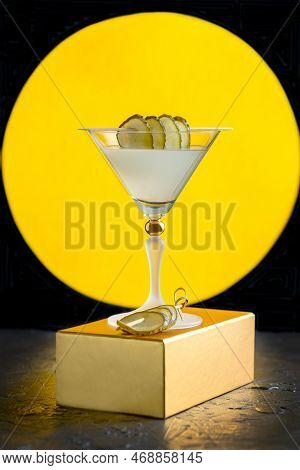 Cold Pickleback Cocktail In A Martini Glass Served With Pickled Cucumber Slices On A Bamboo Skewer, 
