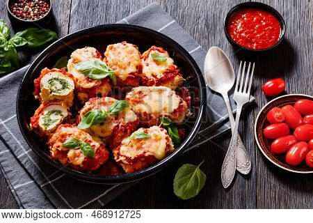 Chicken Rollatini With Spinach Ricotta Filling In Marinara Sauce Topped With Mozzarella Cheese And F