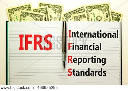Ifrs Symbol. Concept Words Ifrs International Financial Reporting Standards On White Note On Beautif