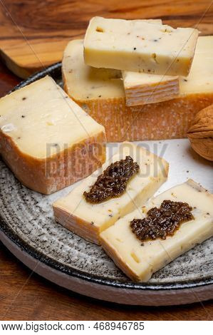Italian Cheese Collection, Yellow Taleggio Cheese With Black Truffles Mushrooms