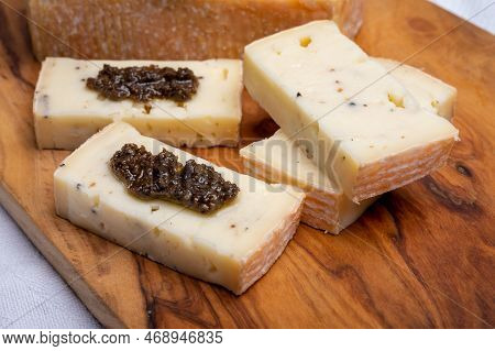 Italian Cheese Collection, Yellow Taleggio Cheese With Black Truffles Mushrooms
