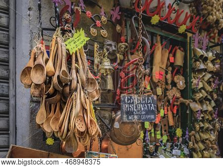 Various Souvenirs On Display At A Gift Shop In Centro Storico, Kitchenware And Utensils, Food And Co