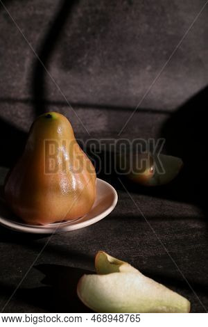 Rose Apple Or Jambu On Dark Background Under Sunlight. Thailand Apple Tropical Fruit Flavors Of Swee