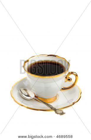Stilfuld kaffekop med sølvske