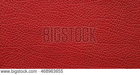 Genuine Leather Dyed Red. Leather Texture Background