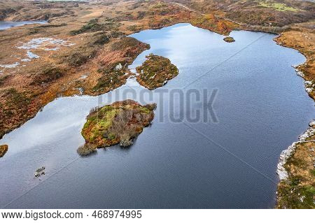 Aerial View Of Lough Doon Between Portnoo And Ardara Which Is Famous For The Medieval Fort - County 