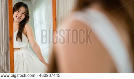 Cute Woman Wearing Dress On Front Mirror Looking Clothes At Home After Morning Wake Up, Beautiful Yo