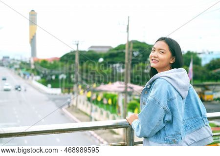 Portrait Happy Young Girl With Beautiful Landscape View At Roiet Thailand.