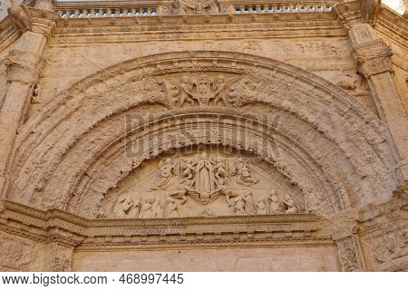 Biar, Alicante, Spain, January 14, 2023: Portico At The Main Entrance Door Of The Church Of Our Lady