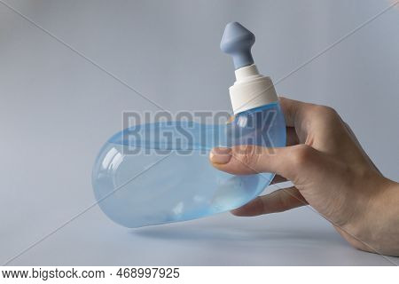 Neti Pot. Ayurvedic Medical Tools For Cleaning Your Nose With Water And Salt At Home. Blue Bowl Of W