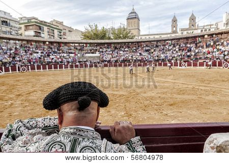 Detail Of Bullfighter Bald And Slightly Fat Looking The Bull During A Bullfight Held In Ubeda